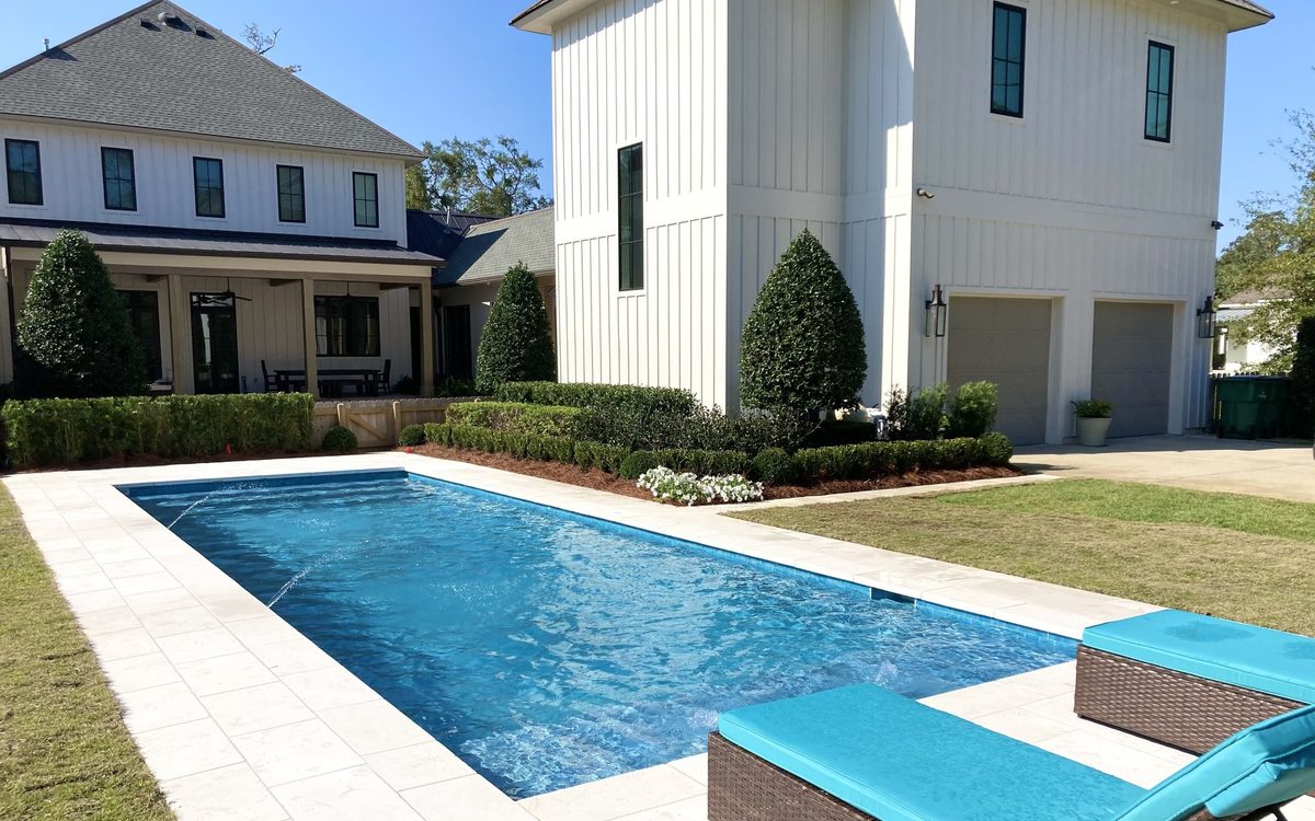 Geometric gunite pool and stone deck from the Maestri Pools gallery